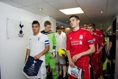 Conor Coady leads Jon Flanagan and the rest of his NextGen team mates out last season against Spurs (Pic: David Rawcliffe)