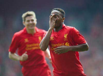 Academy past and present: Steven Gerrard looks on as Raheem Sterling celebrates (Pic: David Rawcliffe)