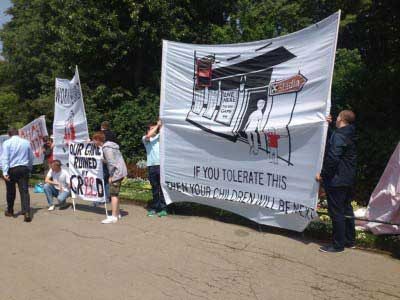 "If you tolerate this..." Banner in protest at the price of Premier League football