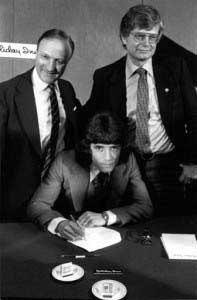 Keegan signs watched by Liverpool chairman John Smith and SV Hamburg President Dr Peter Krohn