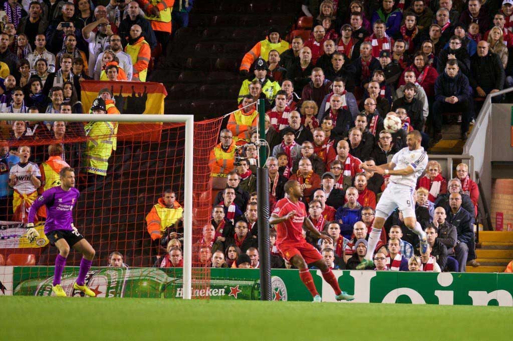 TWO HOT TO HANDLE: Karim Benzema scores the second goal against Liverpool. Pic David Rawcliffe-Propaganda