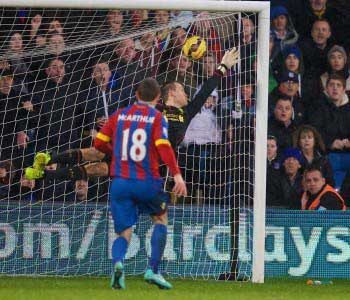 Liverpool's goalkeeper Simon Mignolet is beaten for Crystal Palace's third goal