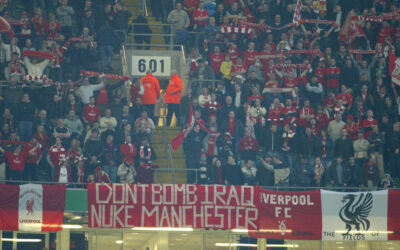 Liverpool fans with banner reading 'Don't Bomb Iraq, Nuke Manchester' during the Football League Cup Final against Manchester United at the Millennium Stadium