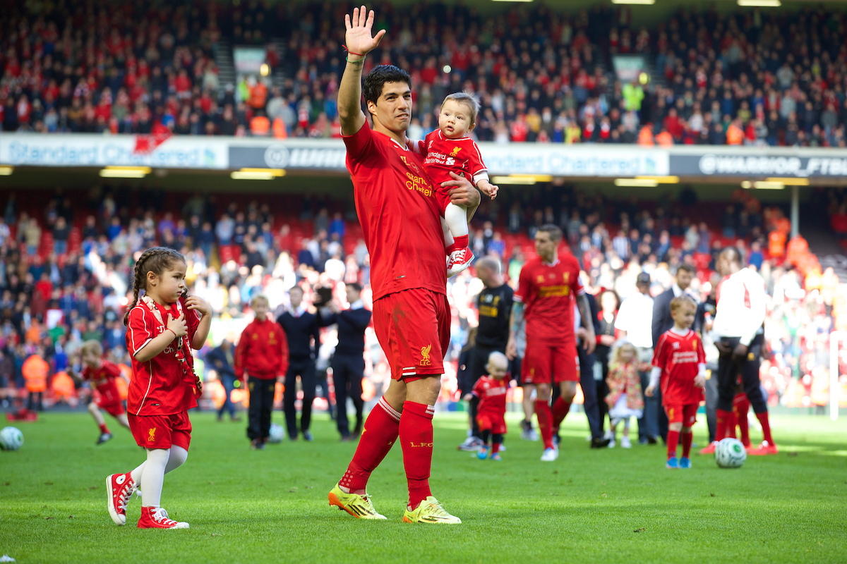 LIVERPOOL, ENGLAND - Sunday, May 11, 2014: Liverpool's Luis Suarez with his daughter Delfina and son Benjamin after the Premiership match against Newcastle United at Anfield. (Pic by David Rawcliffe/Propaganda)