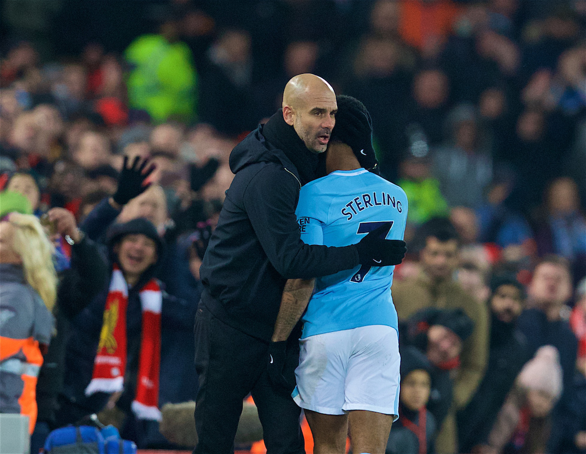 LIVERPOOL, ENGLAND - Sunday, January 14, 2018: Manchester City's Raheem Sterling is embraced by manager Pep Guardiola as he is substituted during the FA Premier League match between Liverpool and Manchester City at Anfield. (Pic by David Rawcliffe/Propaganda)