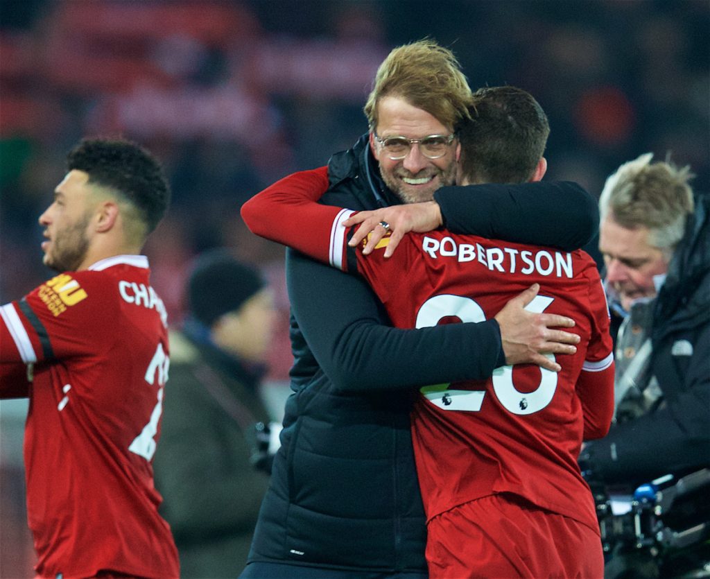 LIVERPOOL, ENGLAND - Sunday, January 14, 2018: Liverpool's manager Jürgen Klopp celebrates with Andy Robertson after his side's 4-3 victory during the FA Premier League match between Liverpool and Manchester City at Anfield. (Pic by David Rawcliffe/Propaganda)