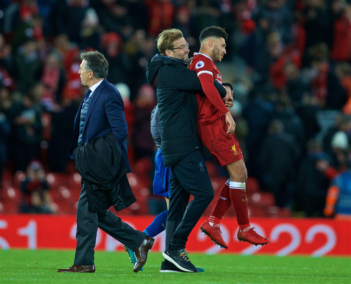 LIVERPOOL, ENGLAND - Saturday, December 30, 2017: Liverpool's manager Jürgen Klopp celebrates with Alex Oxlade-Chamberlain after the 2-1 victory over Leicester City during the FA Premier League match between Liverpool and Leicester City at Anfield. (Pic by David Rawcliffe/Propaganda)