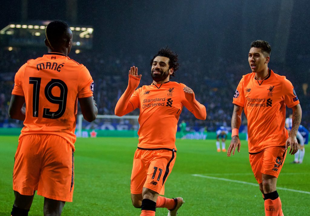 PORTO, PORTUGAL - Wednesday, February 14, 2018: Liverpool's Sadio Mane celebrates scoring the third goal with team-mates Mohamed Salah and Roberto Firmino during the UEFA Champions League Round of 16 1st leg match between FC Porto and Liverpool FC on Valentine's Day at the Est·dio do Drag„o. (Pic by David Rawcliffe/Propaganda)