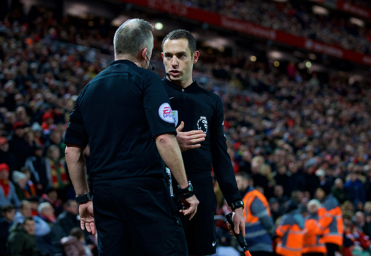 LIVERPOOL, ENGLAND - Sunday, February 4, 2018: Assistant referee Eddie Smart tries to impose a penalty for Tottenham Hotspur onto referee Jonathan Moss during the FA Premier League match between Liverpool FC and Tottenham Hotspur FC at Anfield. (Pic by David Rawcliffe/Propaganda)