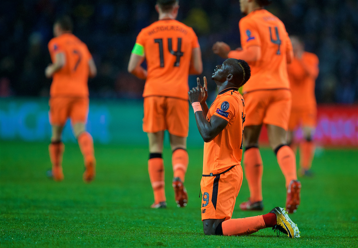 PORTO, PORTUGAL - Wednesday, February 14, 2018: Liverpool's Sadio Mane kneels to pray as he celebrates scoring the first goal during the UEFA Champions League Round of 16 1st leg match between FC Porto and Liverpool FC on Valentine's Day at the Estádio do Dragão. (Pic by David Rawcliffe/Propaganda)