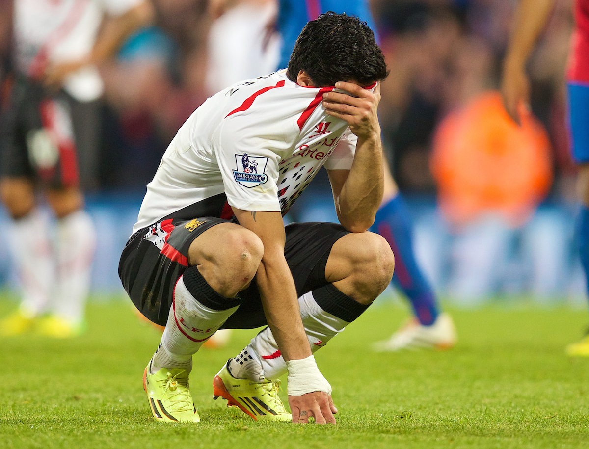 LONDON, ENGLAND - Monday, May 5, 2014: Liverpool's Luis Suarez looks dejected after he sees his side's three goal lead disappear as they draw 3-3 with Crystal Palace during the Premiership match at Selhurst Park. (Pic by David Rawcliffe/Propaganda)