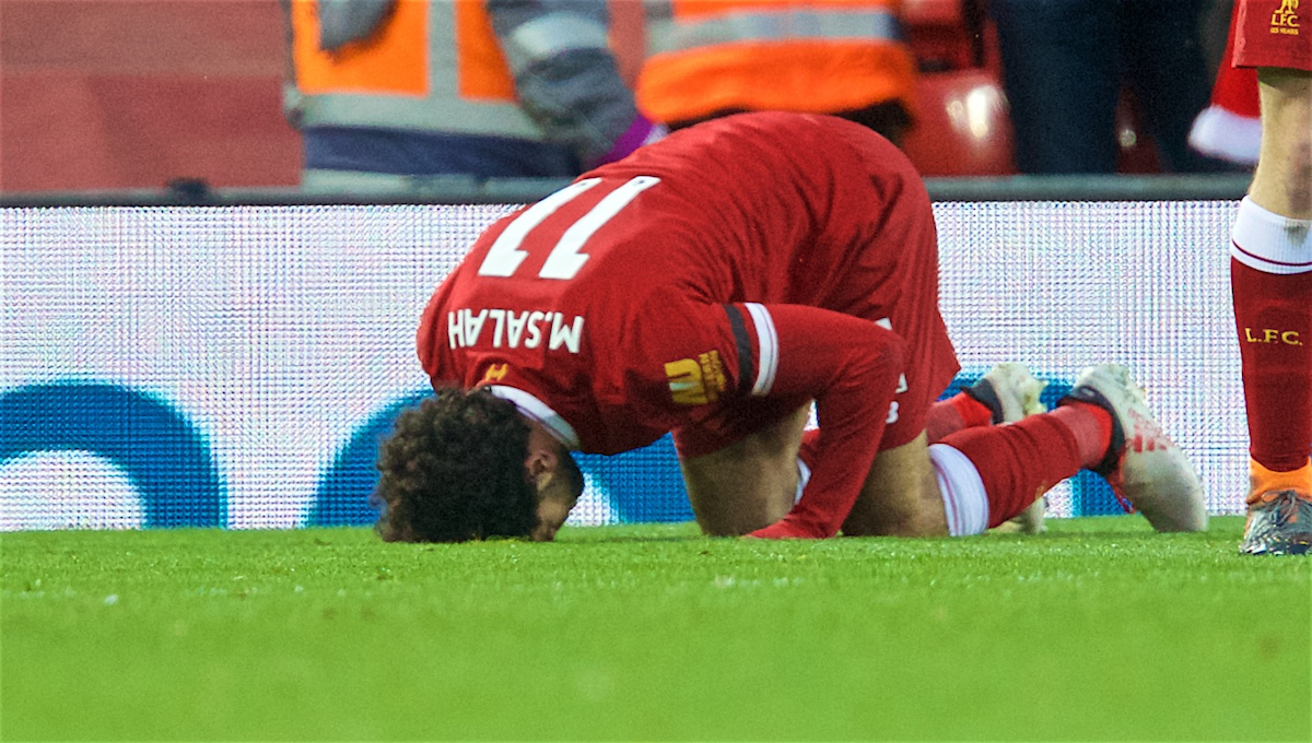 LIVERPOOL, ENGLAND - Saturday, March 17, 2018: Liverpool's Mohamed Salah kneels to pray as he celebrates scoring the second goal during the FA Premier League match between Liverpool FC and Watford FC at Anfield. (Pic by David Rawcliffe/Propaganda)