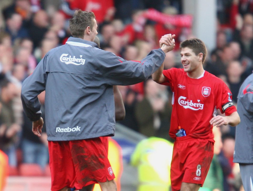 LIVERPOOL, ENGLAND - SATURDAY, FEBRUARY 18th, 2006: Liverpool's match-winner Peter Crouch celebrates his side's 1-0 victory over Manchester United with his captain Steven Gerrard during the FA Cup 5th Round match at Anfield. (Pic by David Rawcliffe/Propaganda)