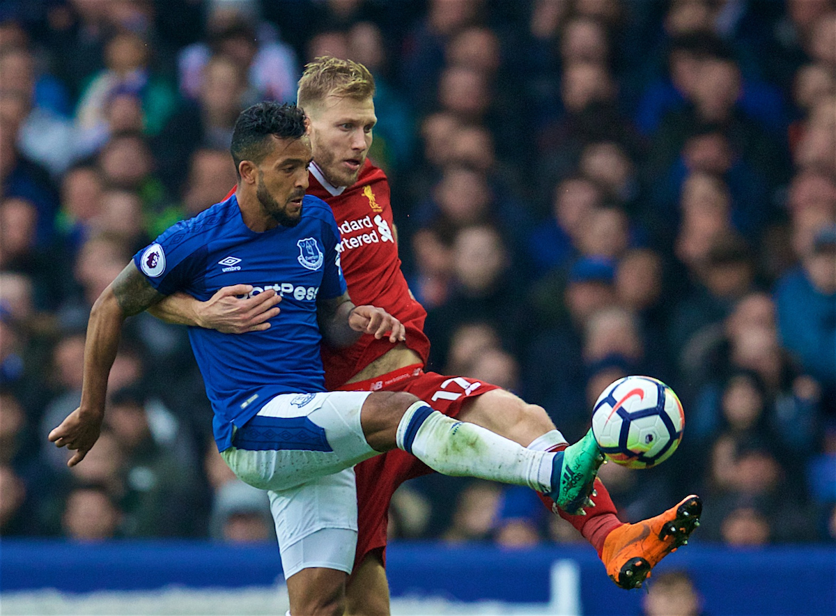 LIVERPOOL, ENGLAND - Saturday, April 7, 2018: Liverpool's Ragnar Klavan and Everton's Theo Walcott during the FA Premier League match between Everton and Liverpool, the 231st Merseyside Derby, at Goodison Park. (Pic by David Rawcliffe/Propaganda)