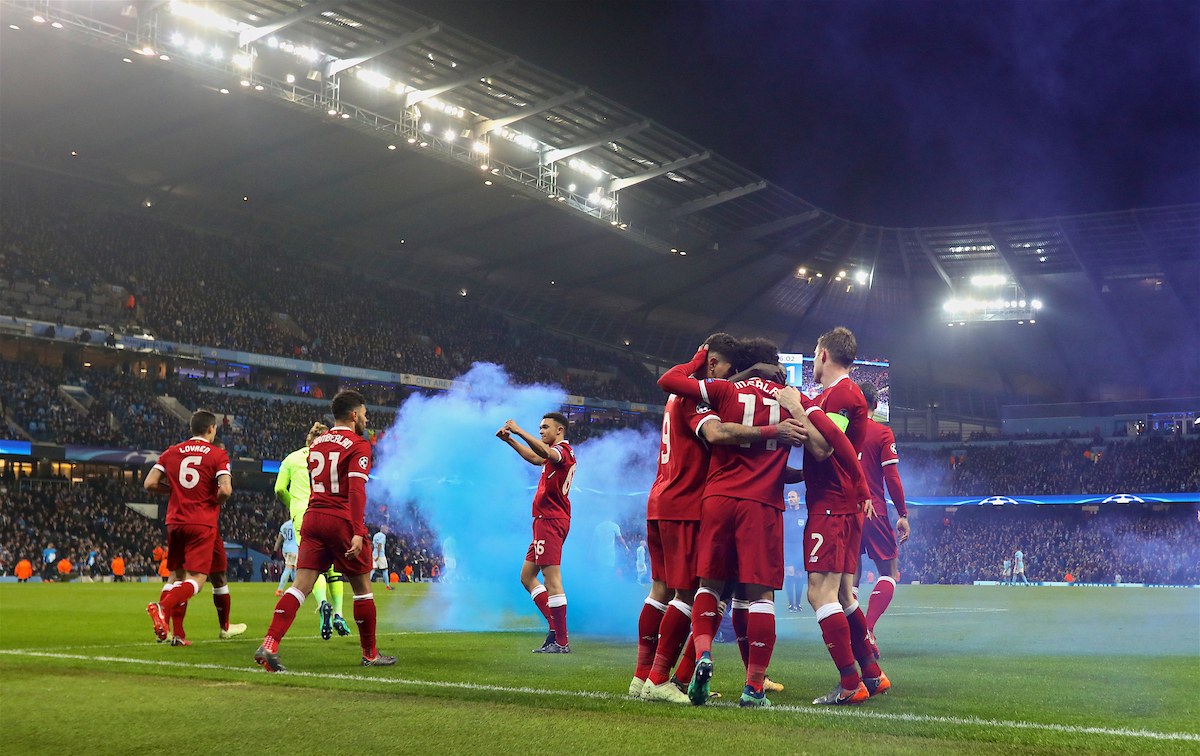 MANCHESTER, ENGLAND - Tuesday, April 10, 2018: Liverpool's Mohamed Salah celebrates scoring the first goal with team-mates as a blue smoke bomb billows in the pitch during the UEFA Champions League Quarter-Final 2nd Leg match between Manchester City FC and Liverpool FC at the City of Manchester Stadium. (Pic by David Rawcliffe/Propaganda)