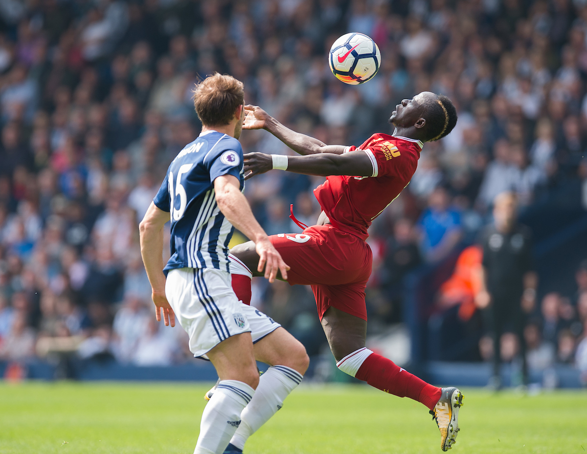 WEST BROMWICH, ENGLAND - Saturday, April 21, 2018: Liverpools Sadio Mane in action with West Bromwich Albions Craig Dawson during the FA Premier League match between West Bromwich Albion FC and Liverpool FC at the Hawthorns. (Pic by Peter Powell/Propaganda)