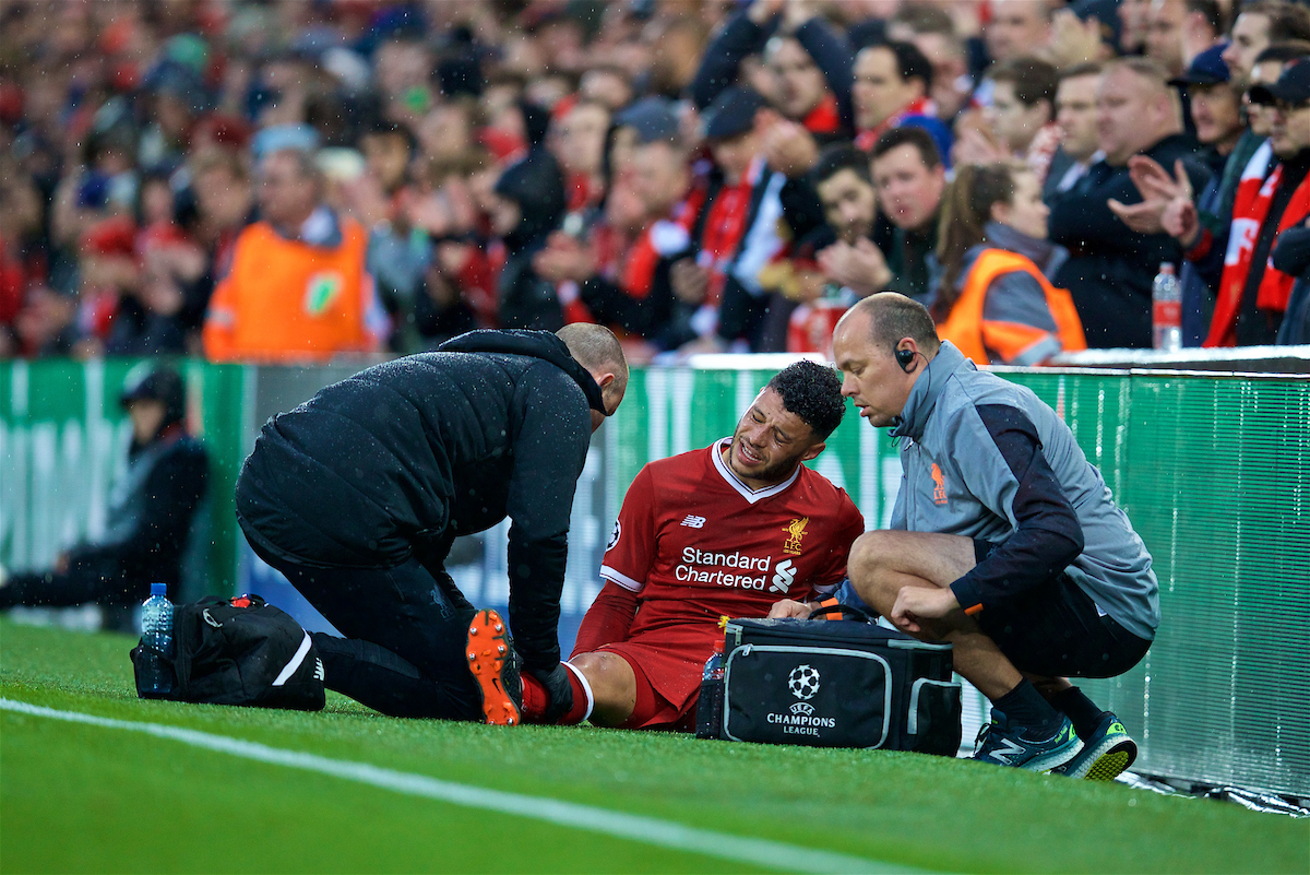 LIVERPOOL, ENGLAND - Tuesday, April 24, 2018: Liverpool's Alex Oxlade-Chamberlain is carried off injured during the UEFA Champions League Semi-Final 1st Leg match between Liverpool FC and AS Roma at Anfield. (Pic by David Rawcliffe/Propaganda)