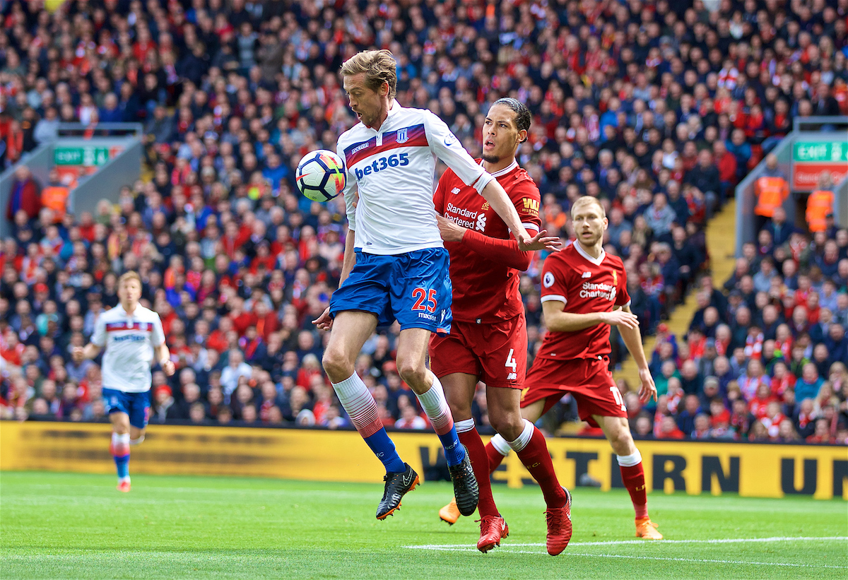 LIVERPOOL, ENGLAND - Saturday, April 28, 2018: Liverpool's Virgil van Dijk and Stoke City's Peter Crouch during the FA Premier League match between Liverpool FC and Stoke City FC at Anfield. (Pic by David Rawcliffe/Propaganda)