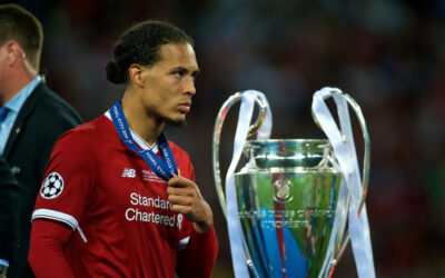 Liverpool's Virgil van Dijk walks past the trophy dejected with his runners-up medal during the UEFA Champions League Final match between Real Madrid CF and Liverpool FC at the NSC Olimpiyskiy