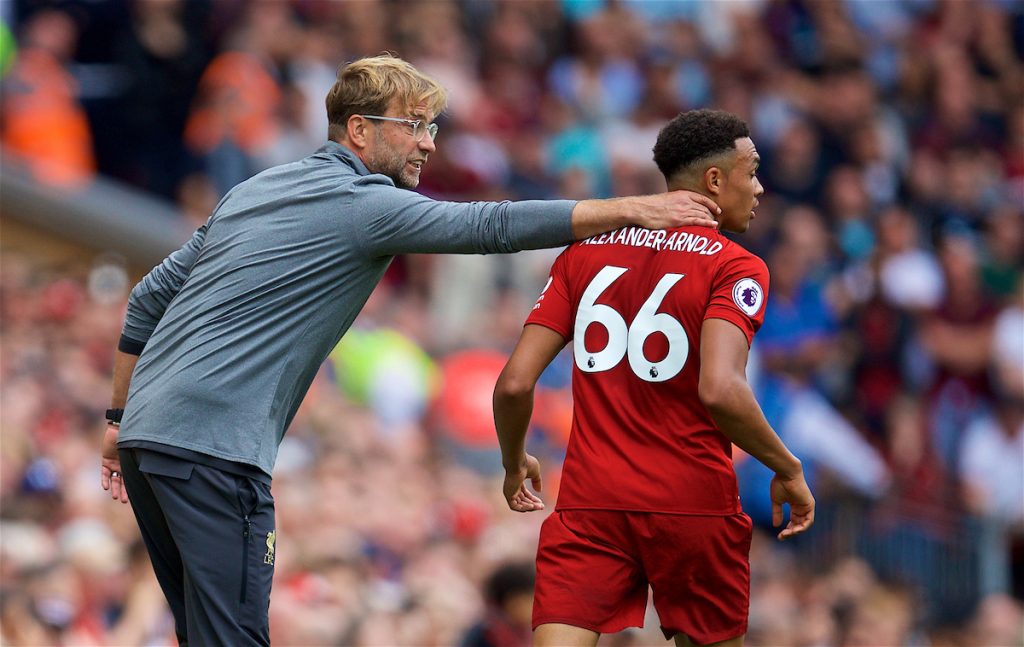 LIVERPOOL, ENGLAND - Sunday, August 12, 2018: Liverpool's manager Jürgen Klopp with Trent Alexander-Arnold during the FA Premier League match between Liverpool FC and West Ham United FC at Anfield. (Pic by David Rawcliffe/Propaganda)