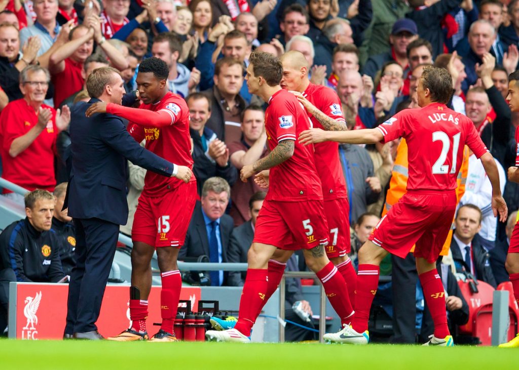 LIVERPOOL, ENGLAND - Sunday, September 1, 2013: Liverpool's Daniel Sturridge celebrates with manager Brendan Rodgers after scoring the first goal against Manchester United during the Premiership match at Anfield. (Pic by David Rawcliffe/Propaganda)