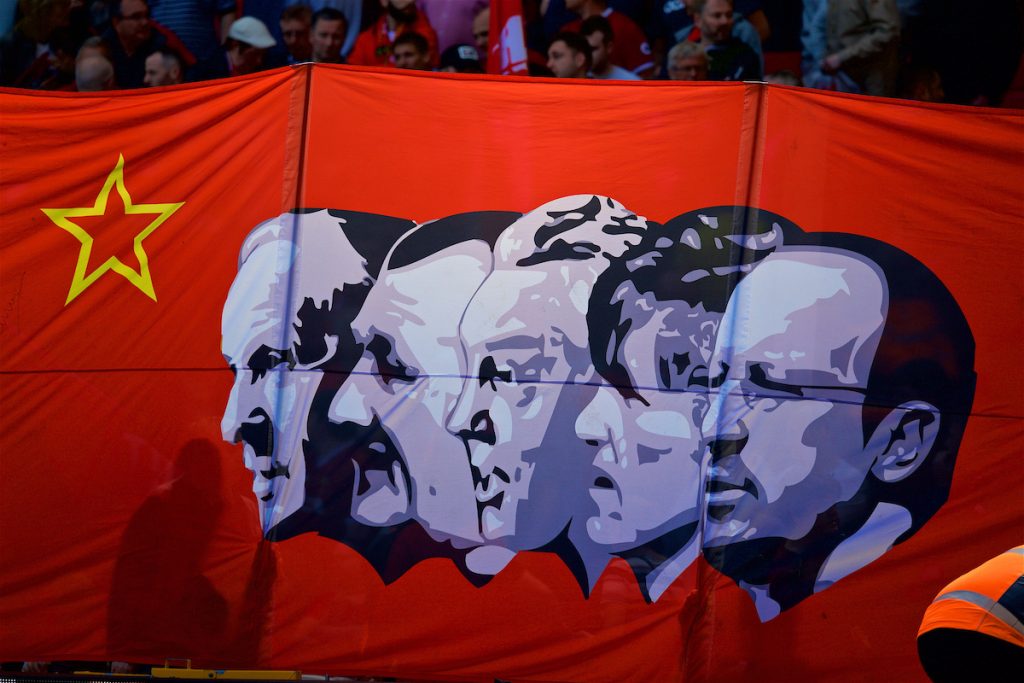 LIVERPOOL, ENGLAND - Sunday, May 13, 2018: A Liverpool supporters' banner on the Spion Kop featuring former managers Bill Shankly, Bob Paisley, Joe Fagan, Kenny Dalglish and Rafael Benitez in a Soviet style before the FA Premier League match between Liverpool FC and Brighton & Hove Albion FC at Anfield. (Pic by David Rawcliffe/Propaganda)