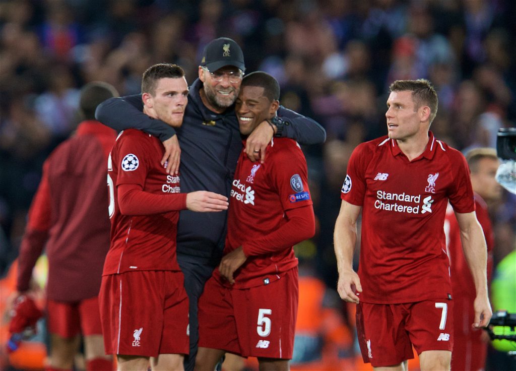 LIVERPOOL, ENGLAND - Tuesday, September 18, 2018: Liverpool's manager Jürgen Klopp (2nd left) celebrates with Andy Robertson (left), Georginio Wijnaldum (2nd right) and James Milner (right) after the UEFA Champions League Group C match between Liverpool FC and Paris Saint-Germain at Anfield. Liverpool won 3-2. (Pic by David Rawcliffe/Propaganda)