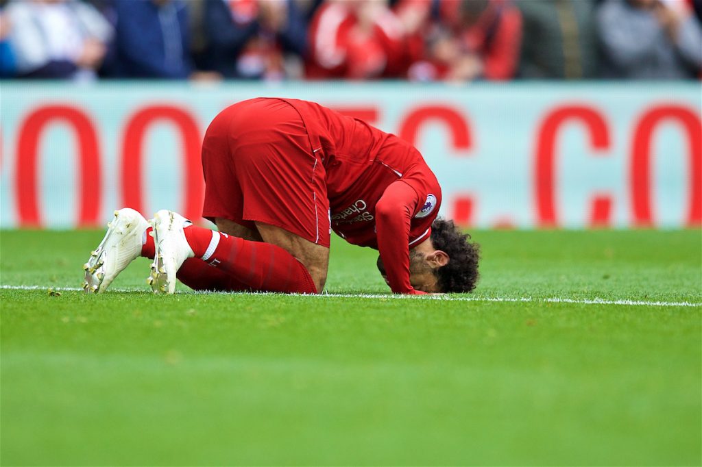 LIVERPOOL, ENGLAND - Saturday, September 22, 2018: Liverpool's Mohamed Salah kneels to pray as he celebrates scoring the third goal during the FA Premier League match between Liverpool FC and Southampton FC at Anfield. (Pic by Jon Super/Propaganda)