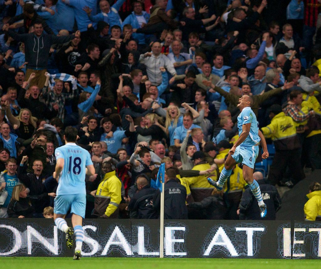 MANCHESTER, ENGLAND - Monday, April 30, 2012: Manchester City's Vincent Kompany celebrates scoring the first goal against Manchester United during the Premiership match at the City of Manchester Stadium. (Pic by David Rawcliffe/Propaganda)