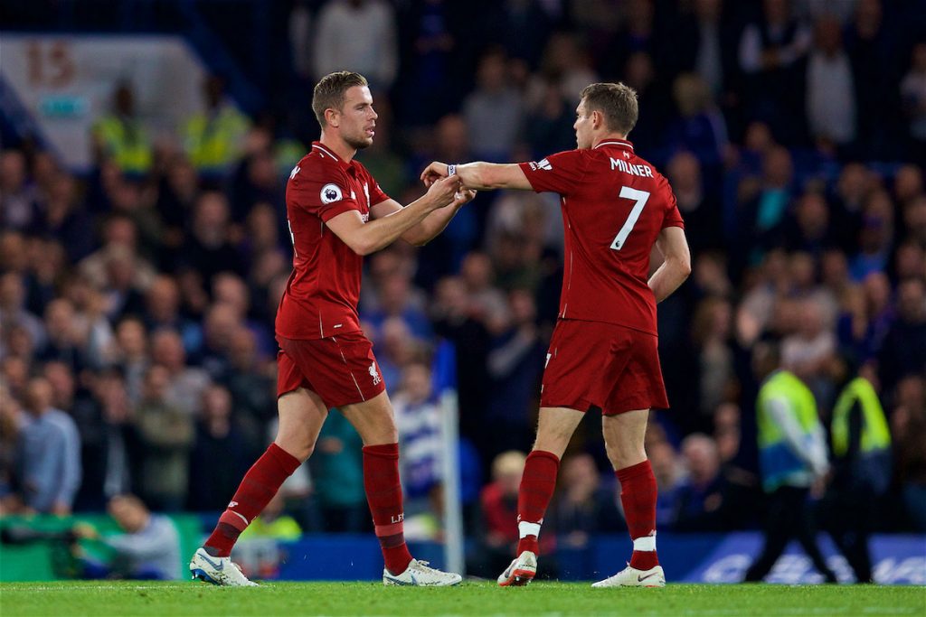 LONDON, ENGLAND - Saturday, September 29, 2018: Liverpool's captain Jordan Henderson (left) hands the captain's armband to James Milner during the FA Premier League match between Chelsea FC and Liverpool FC at Stamford Bridge. (Pic by David Rawcliffe/Propaganda)