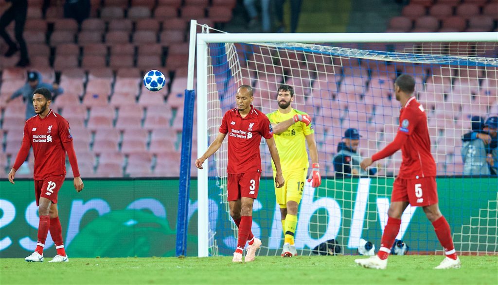 NAPLES, ITALY - Wednesday, October 3, 2018: Liverpool's Fabio Henrique Tavares 'Fabinho' and goalkeeper Alisson Becker look dejected as Napoli score an injury time winning goal during the UEFA Champions League Group C match between S.S.C. Napoli and Liverpool FC at Stadio San Paolo. Napoli won 1-0. (Pic by David Rawcliffe/Propaganda)
