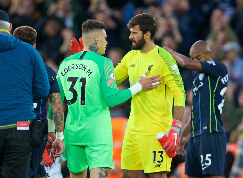 LIVERPOOL, ENGLAND - Sunday, October 7, 2018: Manchester City's goalkeeper Ederson Moraes (L) and Liverpool's goalkeeper Alisson Becker after the FA Premier League match between Liverpool FC and Manchester City FC at Anfield. The game ended goal-less. (Pic by David Rawcliffe/Propaganda)