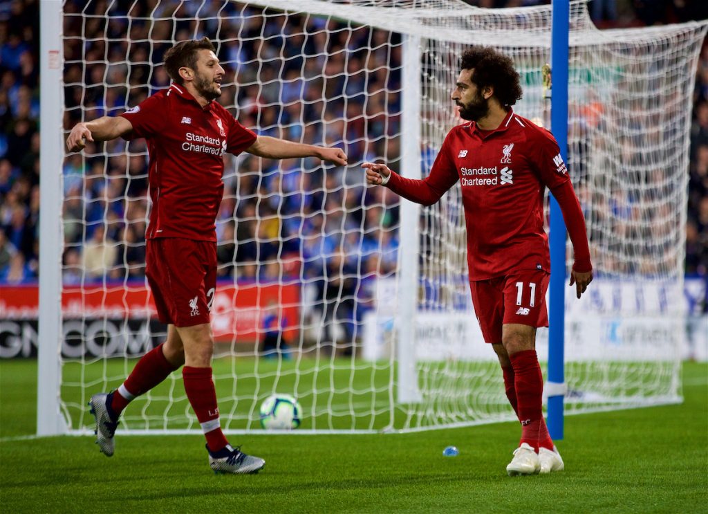 HUDDERSFIELD, ENGLAND - Saturday, October 20, 2018: Liverpool's Mohamed Salah celebrates scoring the first goal with team-mate Adam Lallana during the FA Premier League match between Huddersfield Town FC and Liverpool FC at Kirklees Stadium. (Pic by David Rawcliffe/Propaganda)