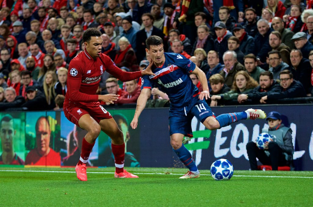 LIVERPOOL, ENGLAND - Wednesday, October 24, 2018: Liverpool's Trent Alexander-Arnold (L) and FK Crvena zvezda Slavoljub Srni? during the UEFA Champions League Group C match between Liverpool FC and FK Crvena zvezda (Red Star Belgrade) at Anfield. (Pic by David Rawcliffe/Propaganda)