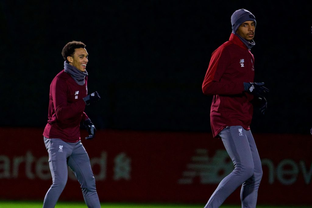 LIVERPOOL, ENGLAND - Monday, December 10, 2018: Liverpool's Trent Alexander-Arnold (L) and Joel Matip (R) during a training session at Melwood Training Ground ahead of the UEFA Champions League Group C match between Liverpool FC and SSC Napoli. (Pic by David Rawcliffe/Propaganda)