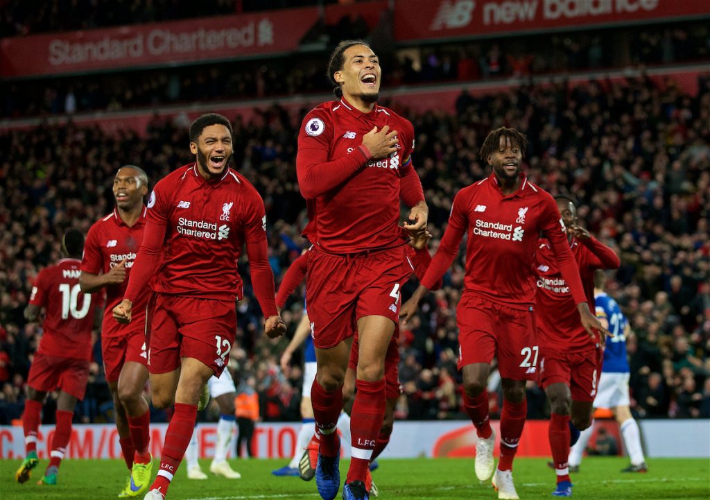 LIVERPOOL, ENGLAND - Sunday, December 2, 2018: Liverpool's Divock Origi (R) celebrates with team-mates Virgil van Dijk (C) and Joe Gomez (L) after his winning goal deep into injury time during the FA Premier League match between Liverpool FC and Everton FC at Anfield, the 232nd Merseyside Derby. Liverpool won 1-0. (Pic by Paul Greenwood/Propaganda)