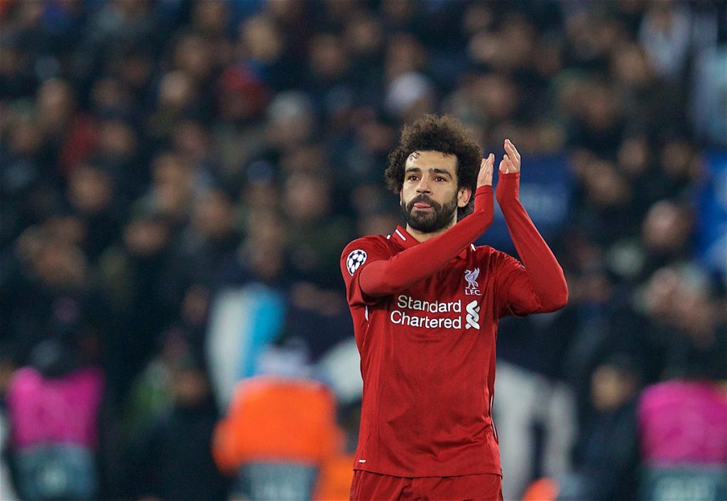 LIVERPOOL, ENGLAND - Tuesday, December 11, 2018: Liverpool's goal-scorer Mohamed Salah celebrates after beating SSC Napoli 1-0 and progressing to the knock-out phase during the UEFA Champions League Group C match between Liverpool FC and SSC Napoli at Anfield. (Pic by David Rawcliffe/Propaganda)