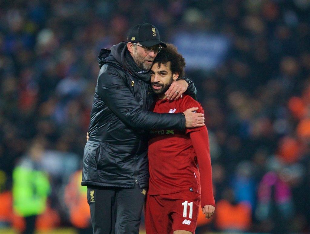 LIVERPOOL, ENGLAND - Tuesday, December 11, 2018: Liverpool's manager Jürgen Klopp celebrates with goal-scorer Mohamed Salah after beating SSC Napoli 1-0 and progressing to the knock-out phase during the UEFA Champions League Group C match between Liverpool FC and SSC Napoli at Anfield. (Pic by David Rawcliffe/Propaganda)