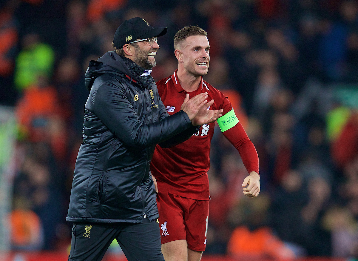 LIVERPOOL, ENGLAND - Tuesday, December 11, 2018: Liverpool's manager Jürgen Klopp celebrates with captain Jordan Henderson after beating SSC Napoli 1-0 and progressing to the knock-out phase during the UEFA Champions League Group C match between Liverpool FC and SSC Napoli at Anfield. (Pic by David Rawcliffe/Propaganda)