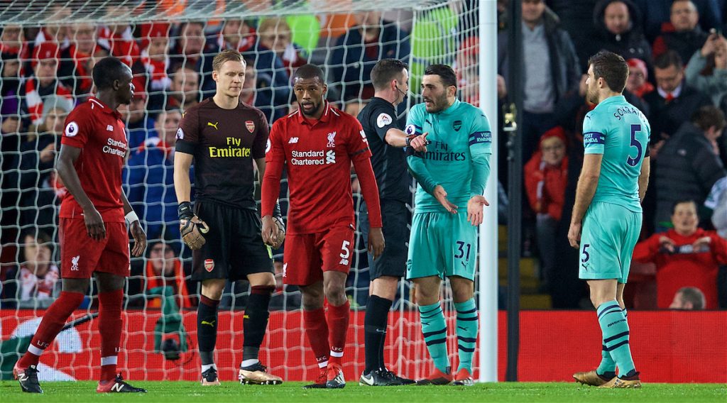 LIVERPOOL, ENGLAND - Saturday, December 29, 2018: Arsenal's Sead Kolainac argues with referee Michael Oliver after he awarded Liverpool a penalty during the FA Premier League match between Liverpool FC and Arsenal FC at Anfield. (Pic by David Rawcliffe/Propaganda)