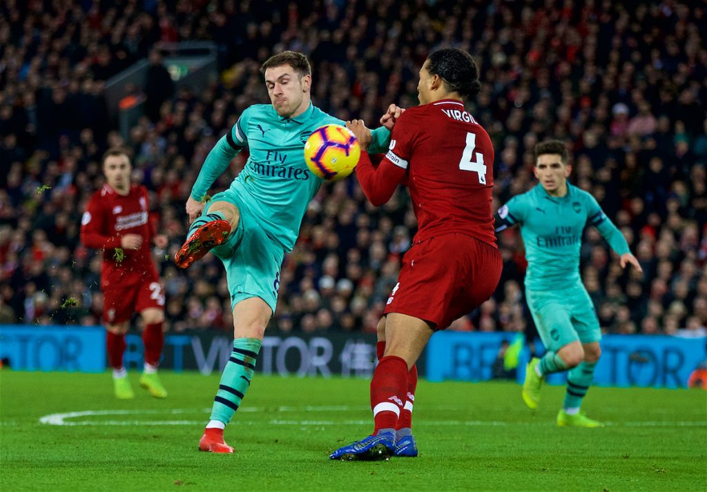 LIVERPOOL, ENGLAND - Saturday, December 29, 2018: Arsenal's Aaron Ramsey and Liverpool's Virgil van Dijk during the FA Premier League match between Liverpool FC and Arsenal FC at Anfield. (Pic by David Rawcliffe/Propaganda)