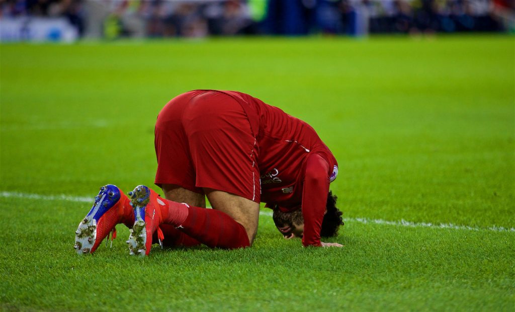 BRIGHTON AND HOVE, ENGLAND - Saturday, January 12, 2019: Liverpool's Mohamed Salah kneels to pray as he celebrates scoring the first goal during the FA Premier League match between Brighton & Hove Albion FC and Liverpool FC at the American Express Community Stadium. (Pic by David Rawcliffe/Propaganda)