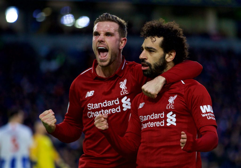 BRIGHTON AND HOVE, ENGLAND - Saturday, January 12, 2019: Liverpool's Mohamed Salah (R) celebrates scoring the first goal from a penalty kick with team-mate captain Jordan Henderson (L) during the FA Premier League match between Brighton & Hove Albion FC and Liverpool FC at the American Express Community Stadium. (Pic by David Rawcliffe/Propaganda)