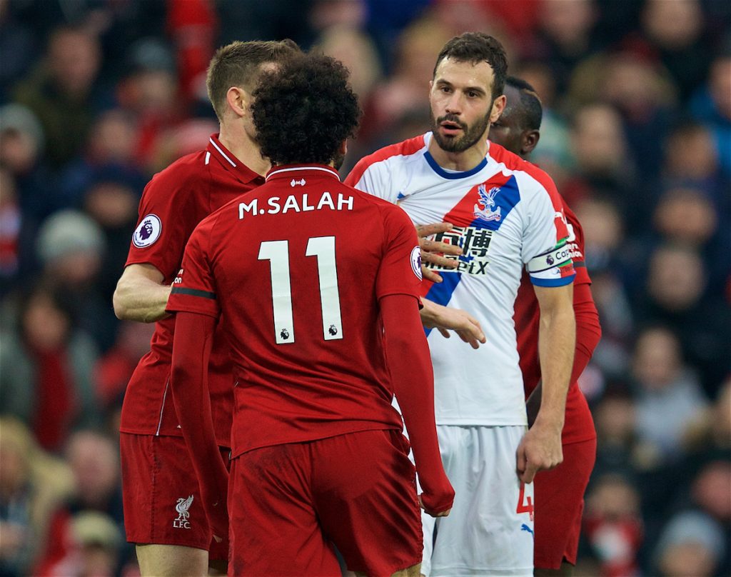 LIVERPOOL, ENGLAND - Saturday, January 19, 2019: Crystal Palace's captain Luka Milivojevi? clashes with Liverpool's Mohamed Salah during the FA Premier League match between Liverpool FC and Crystal Palace FC at Anfield. (Pic by David Rawcliffe/Propaganda)