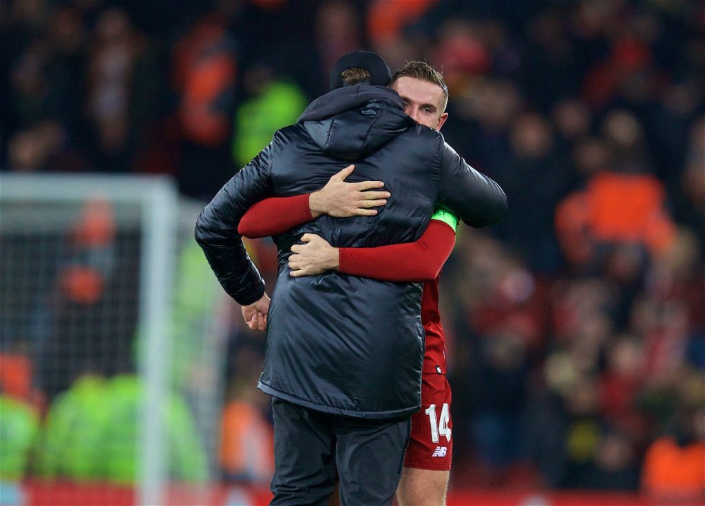 LIVERPOOL, ENGLAND - Tuesday, December 11, 2018: Liverpool's manager Jürgen Klopp celebrates with captain Jordan Henderson after beating SSC Napoli 1-0 and progressing to the knock-out phase during the UEFA Champions League Group C match between Liverpool FC and SSC Napoli at Anfield. (Pic by David Rawcliffe/Propaganda)