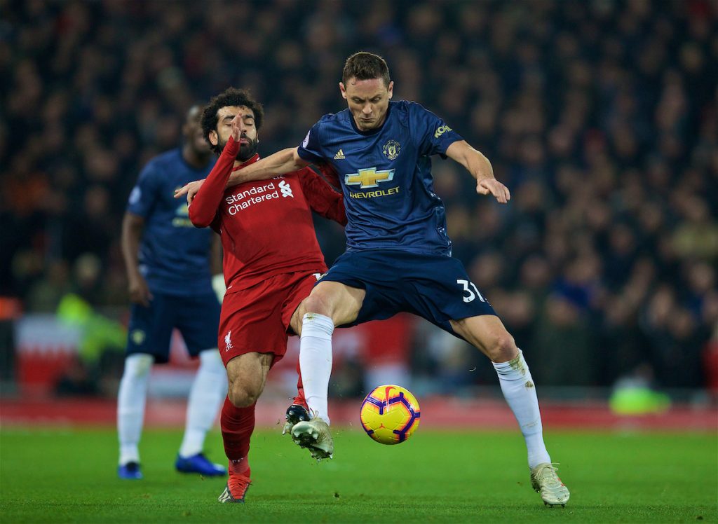 LIVERPOOL, ENGLAND - Sunday, December 16, 2018: Liverpool's Mohamed Salah (L) and Manchester United's Nemanja Mati? during the FA Premier League match between Liverpool FC and Manchester United FC at Anfield. (Pic by David Rawcliffe/Propaganda)