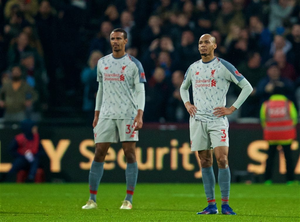 LONDON, ENGLAND - Monday, February 4, 2019: Liverpool's Joel Matip and Fabio Henrique Tavares 'Fabinho' look dejected as West Ham United score an equalising goal during the FA Premier League match between West Ham United FC and Liverpool FC at the London Stadium. (Pic by David Rawcliffe/Propaganda)