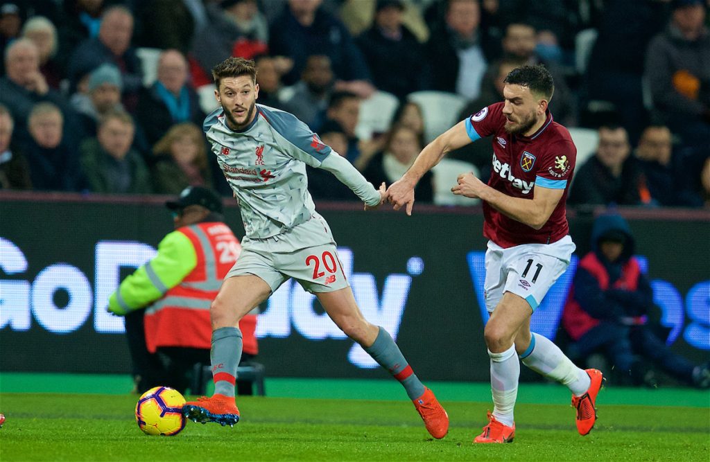 LONDON, ENGLAND - Monday, February 4, 2019: Liverpool's Adam Lallana and West Ham United's Robert Snodgrass during the FA Premier League match between West Ham United FC and Liverpool FC at the London Stadium. (Pic by David Rawcliffe/Propaganda)