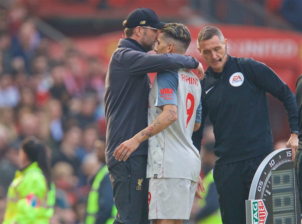 MANCHESTER, ENGLAND - Sunday, February 24, 2019: Liverpool's Roberto Firmino embraces manager Jürgen Klopp after being injured during the FA Premier League match between Manchester United FC and Liverpool FC at Old Trafford. (Pic by David Rawcliffe/Propaganda)