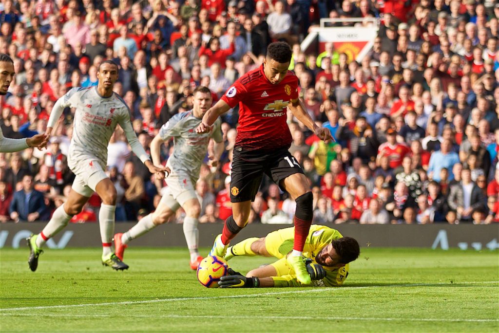 MANCHESTER, ENGLAND - Sunday, February 24, 2019: Liverpool's goalkeeper Alisson Becker makes a save from Manchester United's Jesse Lingard during the FA Premier League match between Manchester United FC and Liverpool FC at Old Trafford. (Pic by David Rawcliffe/Propaganda)